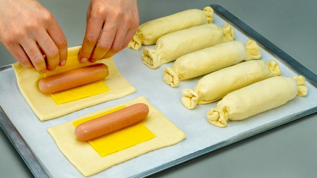 candies made of puff pastry and sausages an appetizer when you are